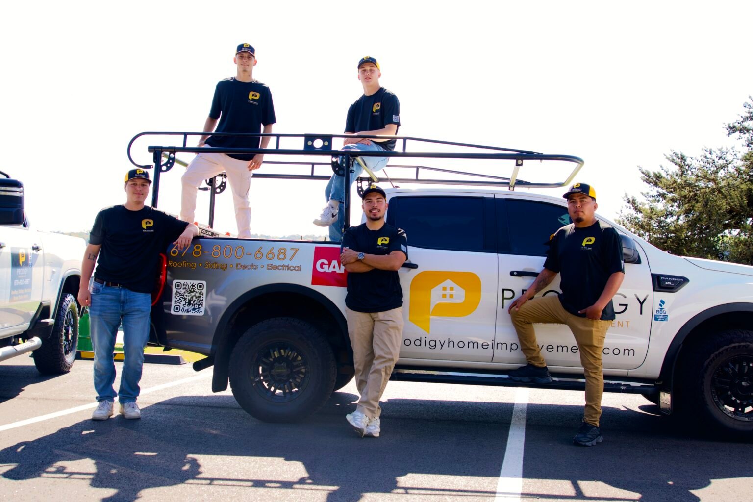 Prodigy crew and branded truck at a jobsite