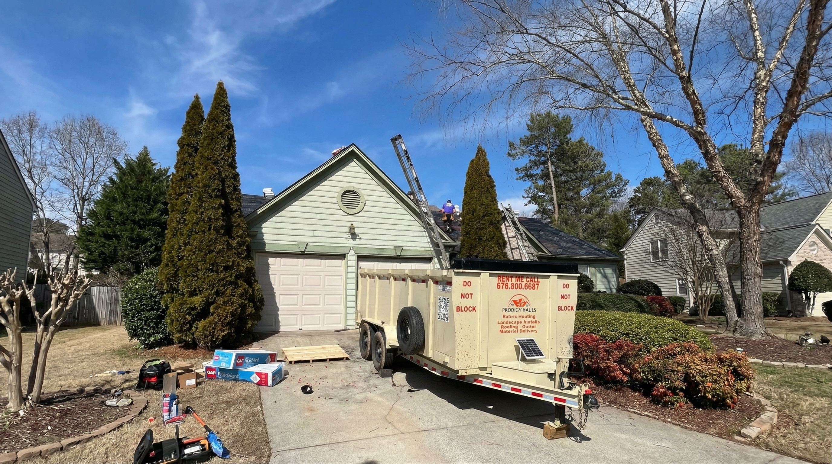 Prodigy Home Improvement hauls and dump trailer service for construction debris removal