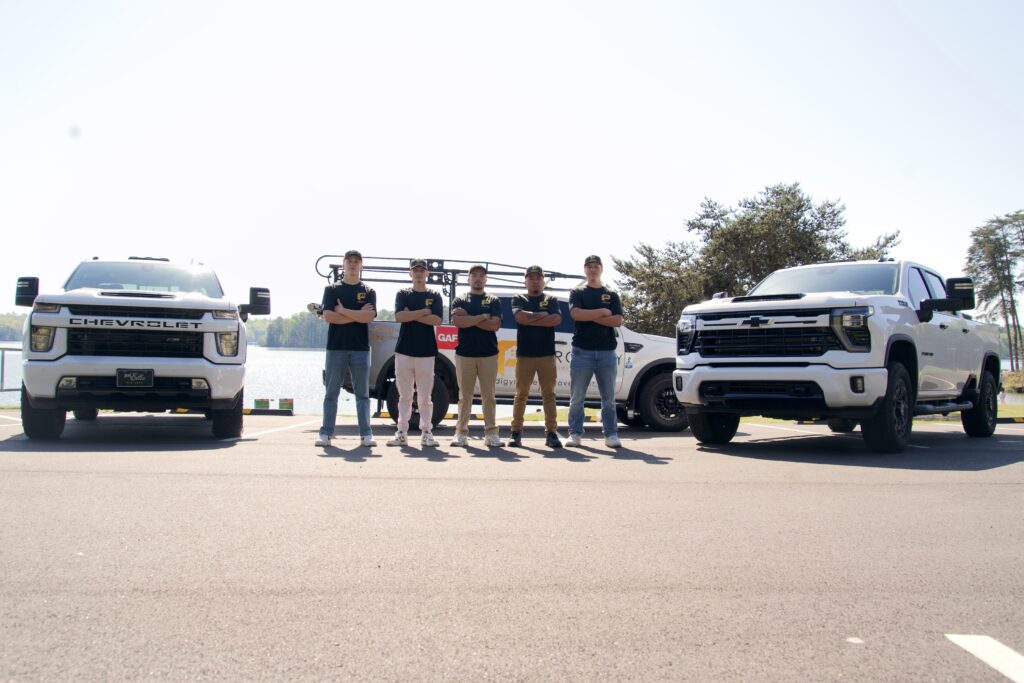 Prodigy Home Improvement owner supervising a roofing project on-site in Cumming GA
